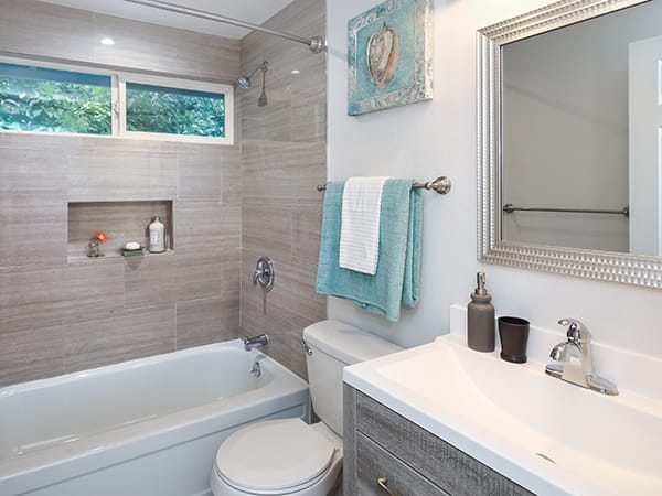 Bathroom remodel with custom vanity and fixture installation in Millstone New Jersey