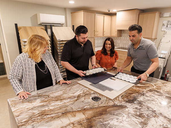 Homeowners selecting materials at a New Jersey home renovation showroom